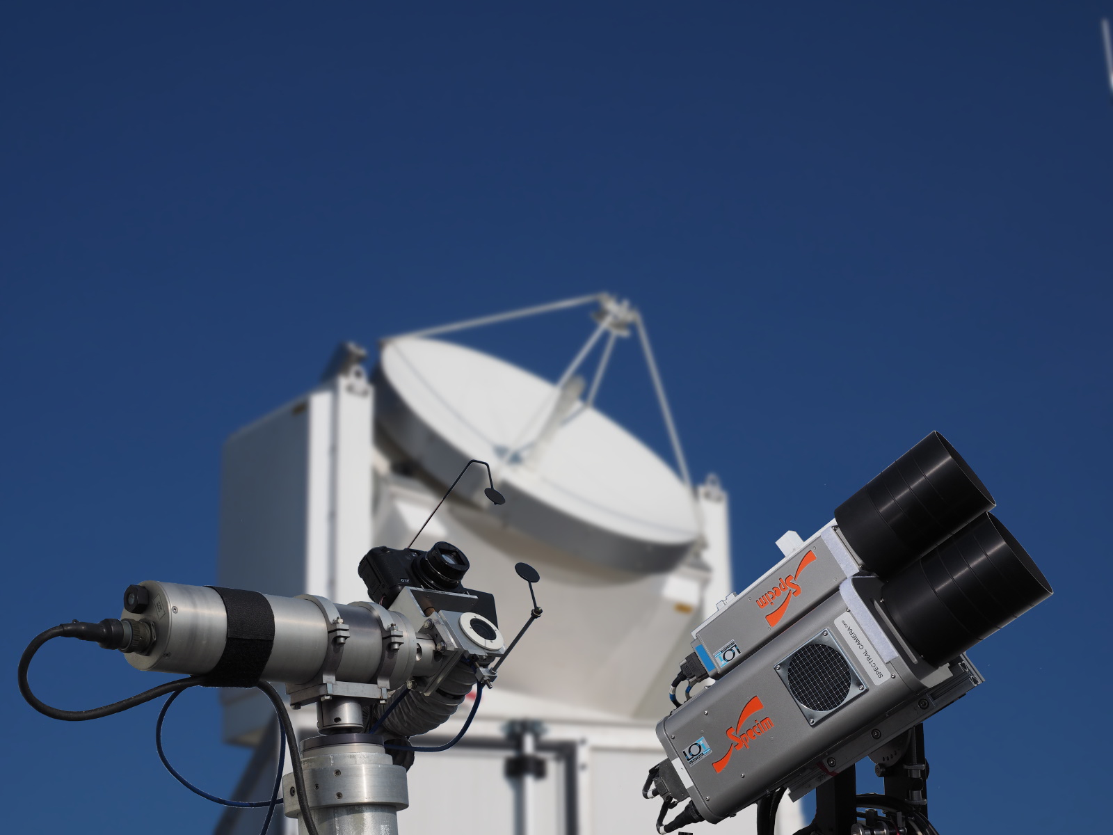 Ground-based atmospheric remote-sensing instruments in front of a large radar antenna