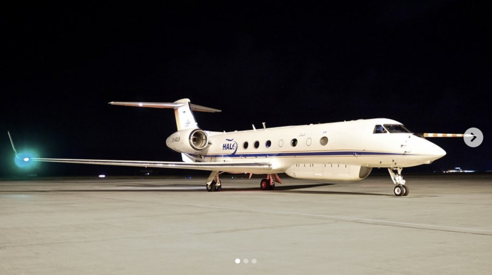 HALO research aircraft on the ground at night